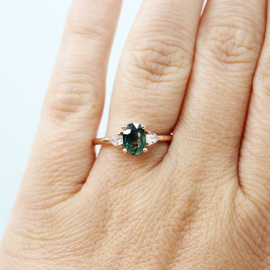 Faye Ring with a 1.25 Carat Australian Oval Teal Sapphire and White Accents Diamonds in 14k Rose Gold - Ready to Size and Ship