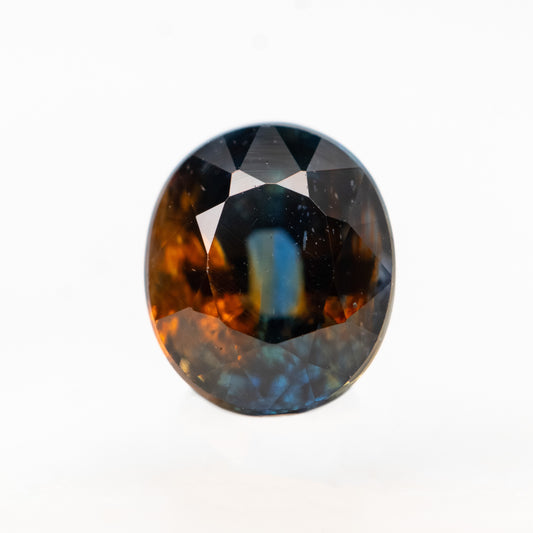 1.14 Carat Bicolor Blue and Orange Oval Sapphire for Custom Work - Inventory Code BBOS114