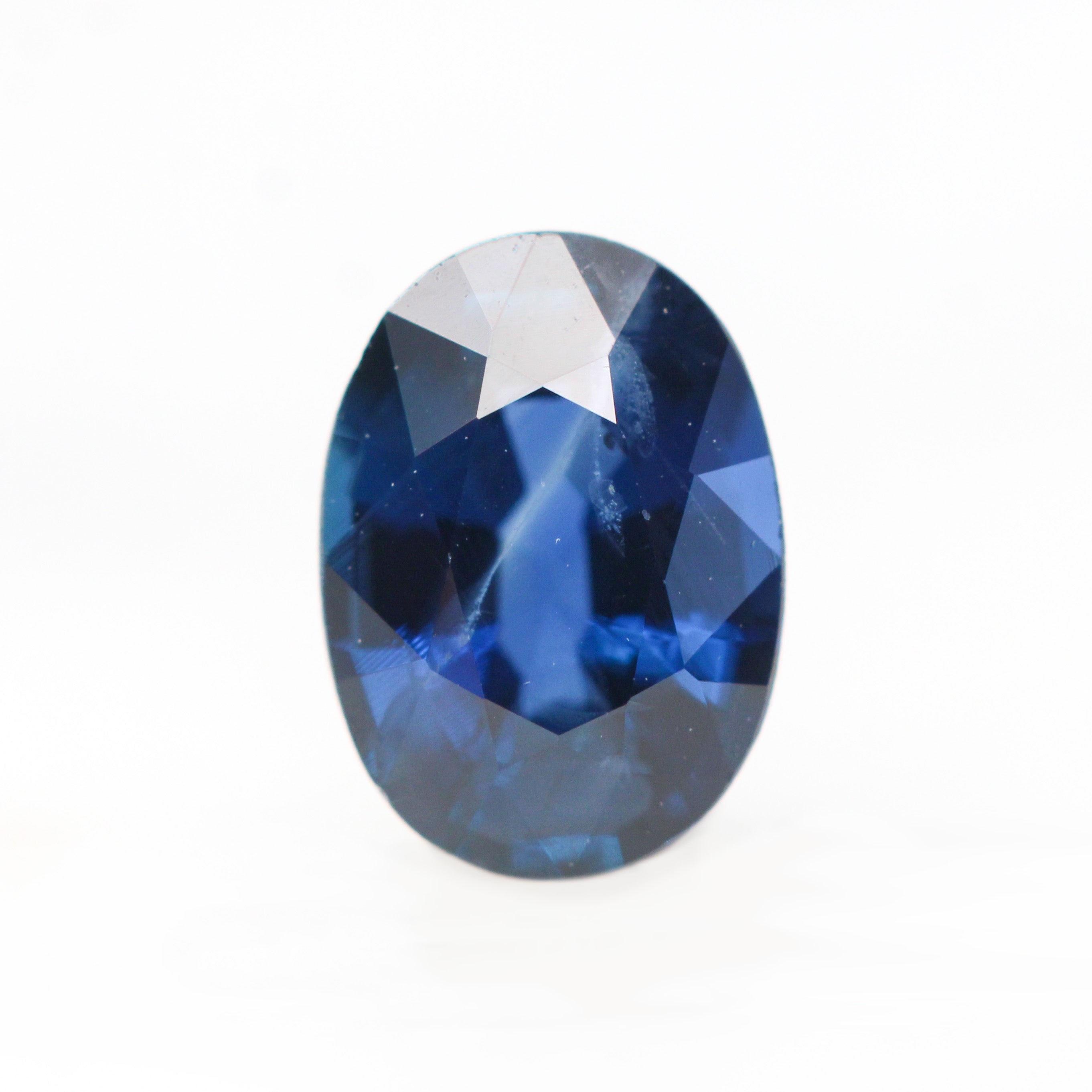 0.91 Carat Deep Blue Oval Sapphire for Custom Work - Inventory Code BOS091