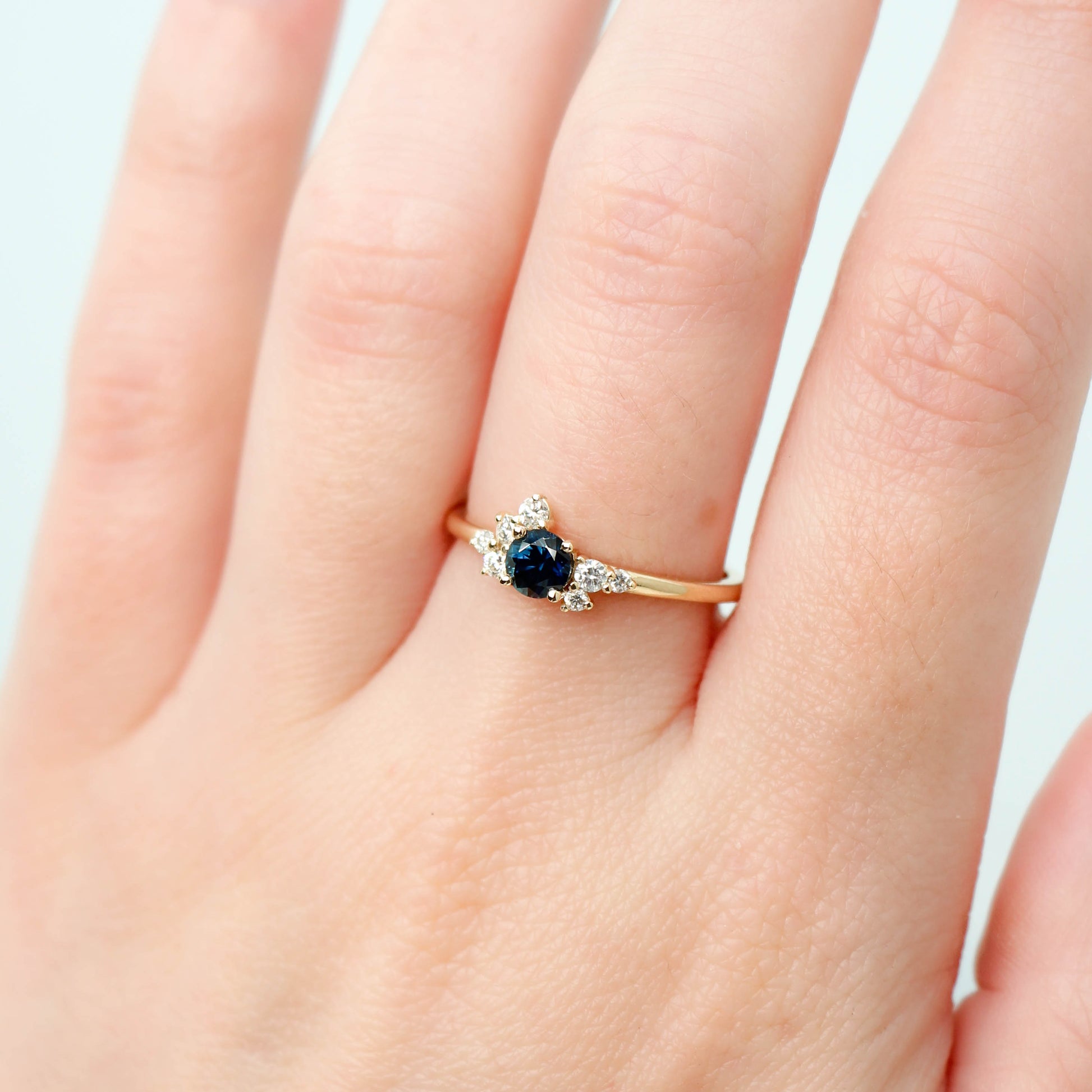 Baby Orion Ring with a 0.44 Carat Deep Blue Sapphire and White Accent Diamonds in 14k Yellow Gold - Ready to Size and Ship - Midwinter Co. Alternative Bridal Rings and Modern Fine Jewelry