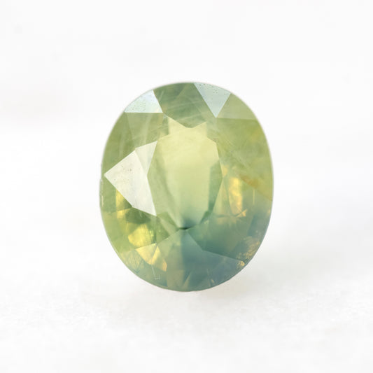 1.39 Carat Light Green Bicolor Oval Sapphire for Custom Work - Inventory Code GBOS139