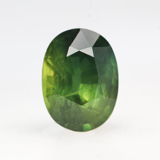 1.85 Carat Yellow-Green Oval Sapphire for Custom Work - Inventory Code GOS185