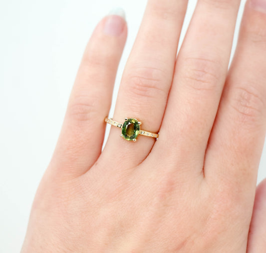 Heath Ring with a 1.20 Carat Green Oval Sapphire and White Accent Diamonds in 14k Yellow Gold - Ready to Size and Ship