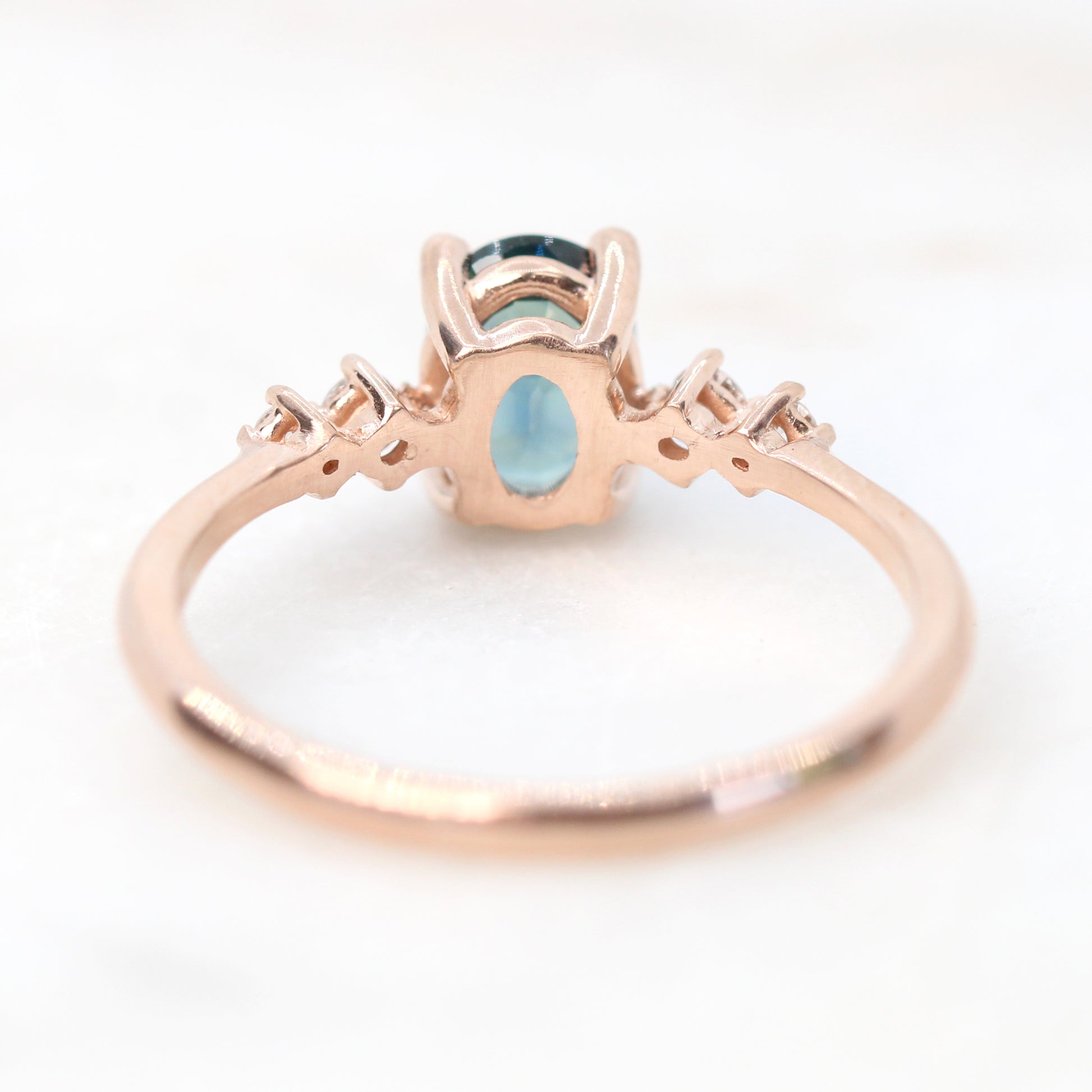 Cordelia Ring with a 1.17 Carat Oval Light Teal Blue Sapphire and White Accent Diamonds in 10k Rose Gold - Ready to Size and Ship - Midwinter Co. Alternative Bridal Rings and Modern Fine Jewelry