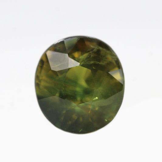 1.94 Carat Golden Green Oval Sapphire for Custom Work - Inventory Code GOS194