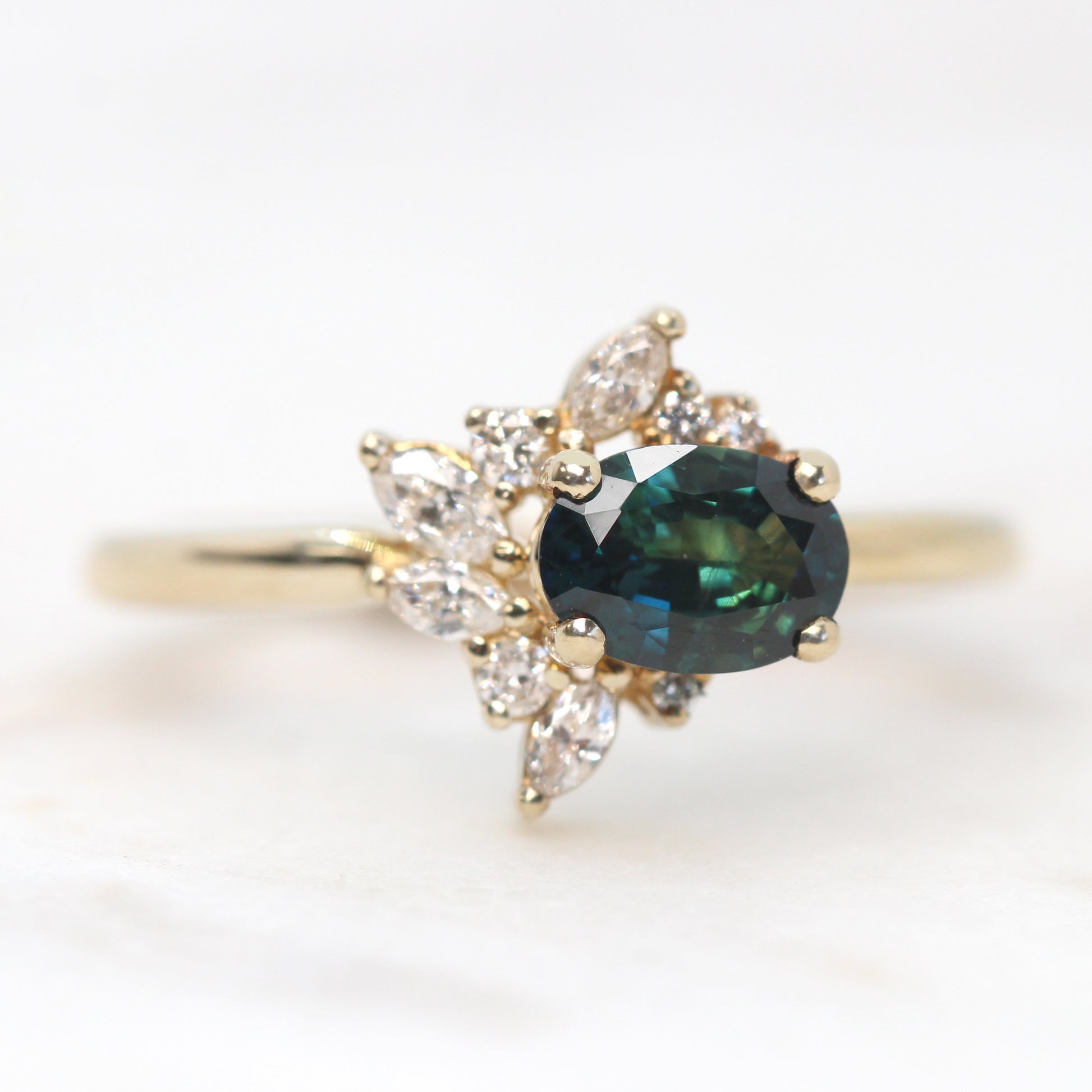 Amaya Ring with a 0.79 Carat Teal Oval Sapphire and White Accent Diamonds in 10k Yellow Gold - Ready to Size and Ship - Midwinter Co. Alternative Bridal Rings and Modern Fine Jewelry