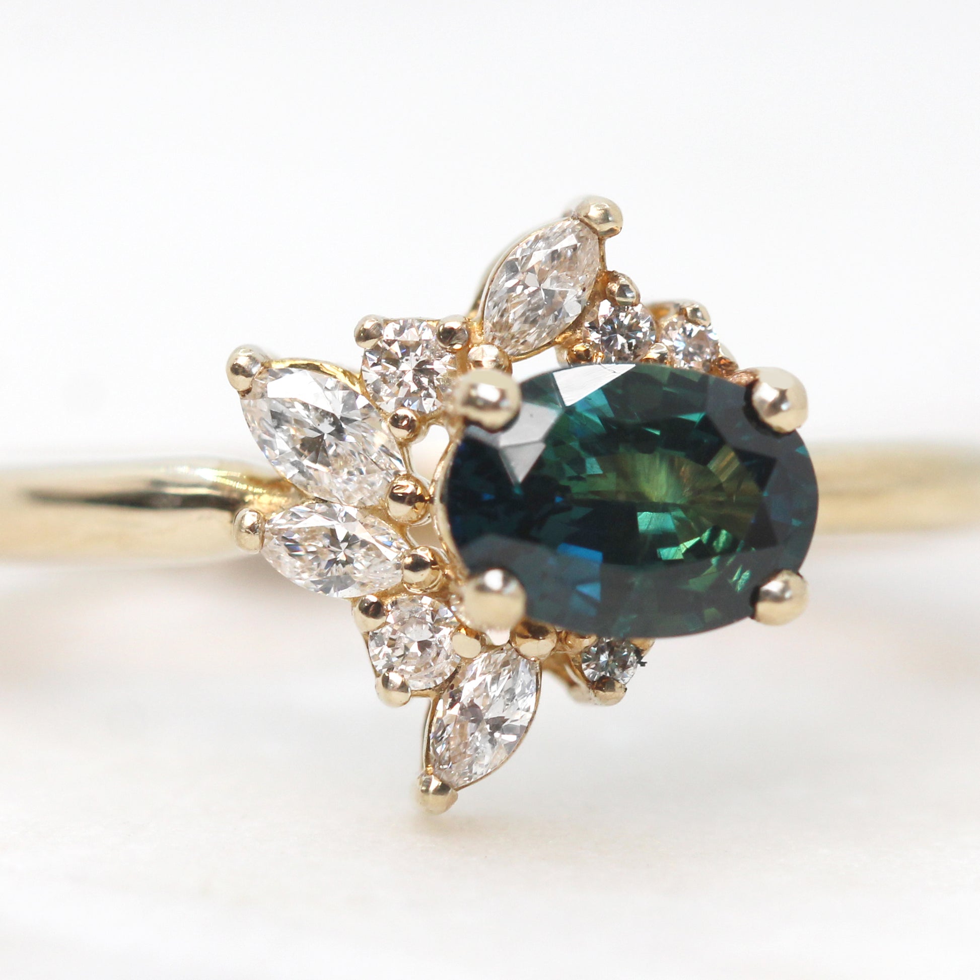 Amaya Ring with a 0.79 Carat Teal Oval Sapphire and White Accent Diamonds in 10k Yellow Gold - Ready to Size and Ship - Midwinter Co. Alternative Bridal Rings and Modern Fine Jewelry