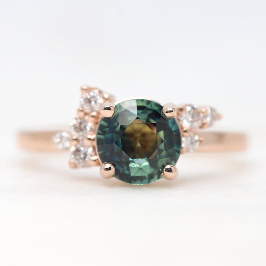 Project: Custom Baby Orion Cluster Ring with a 1.5 Carat Teal Blue Sapphire and Asymmetrical Accent Diamonds in 14k