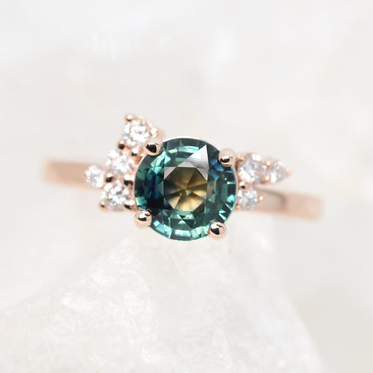 Project: Custom Baby Orion Cluster Ring with a 1.5 Carat Teal Blue Sapphire and Asymmetrical Accent Diamonds in 14k