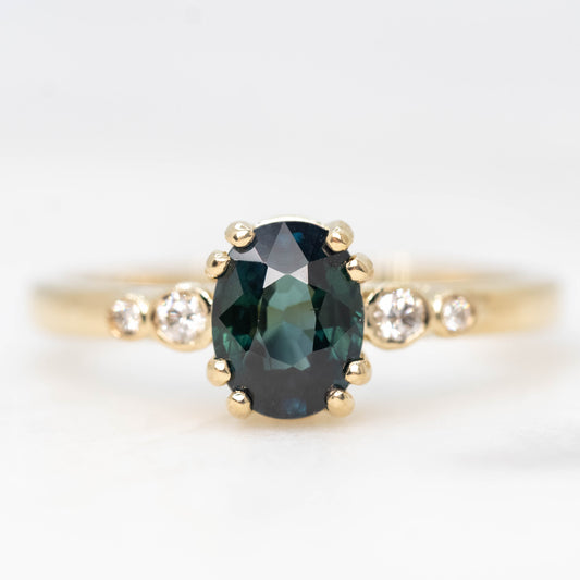 Joyce Ring with a 1.21 Carat Oval Teal Sapphire and White Diamond Accents in 14k Yellow Gold - Ready to Size and Ship