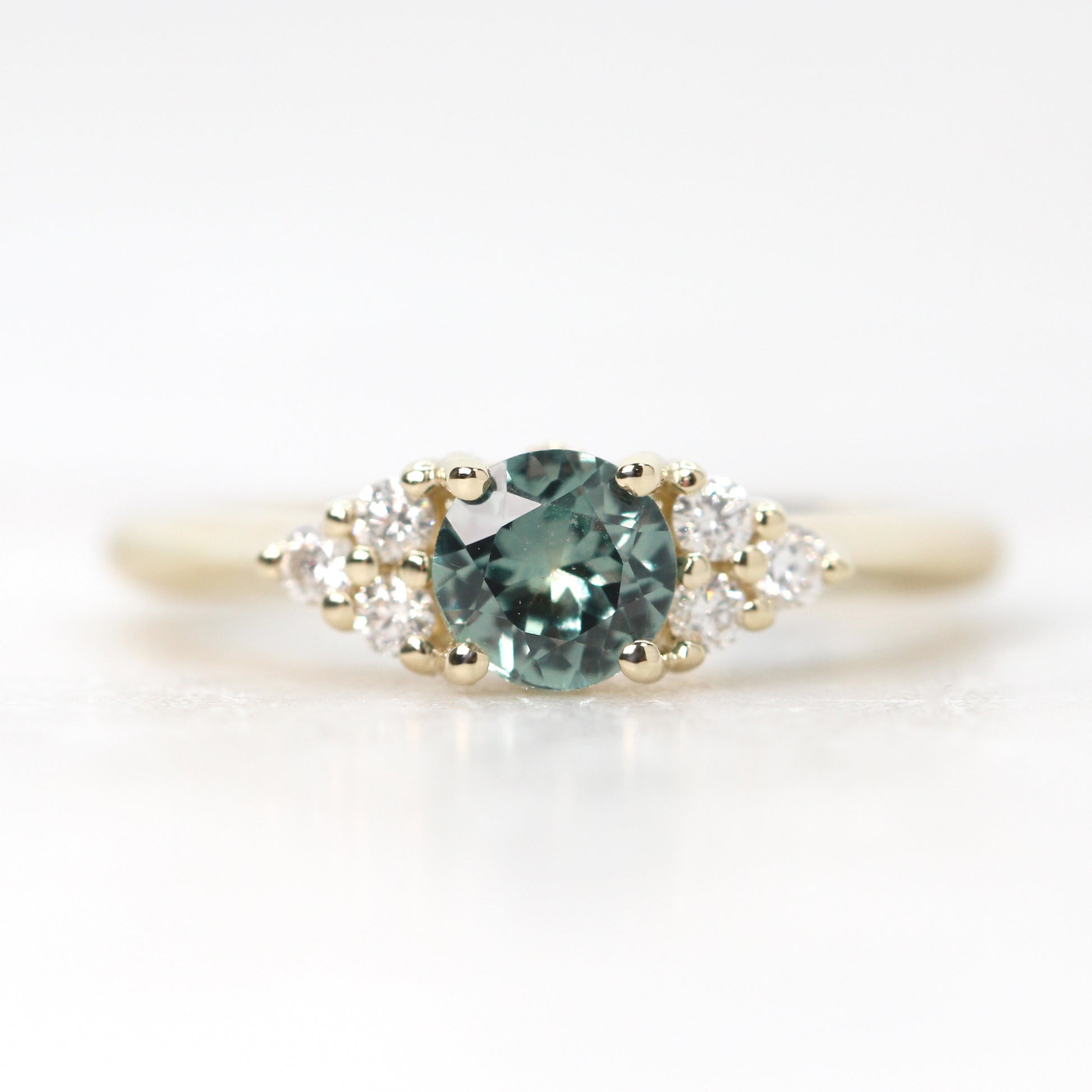 The Aster Ring with a Pear-Cut White Diamond