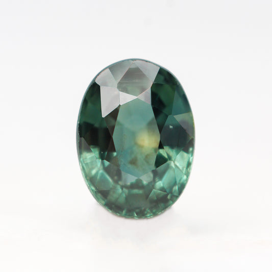 1.33 Carat Teal Green Oval Sapphire for Custom Work - Inventory Code TOS133