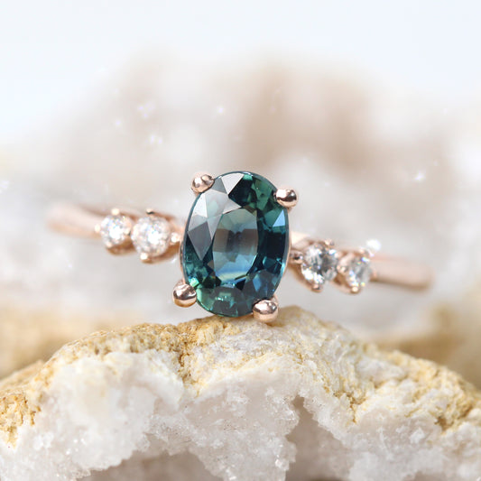 Cordelia Ring with a 1.17 Carat Oval Light Teal Blue Sapphire and White Accent Diamonds in 10k Rose Gold - Ready to Size and Ship - Midwinter Co. Alternative Bridal Rings and Modern Fine Jewelry