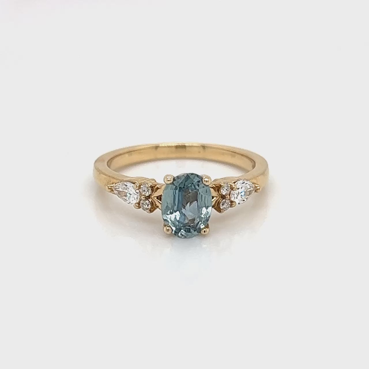 Project: Custom Jenna Ring with a 1 Carat Light Blue Oval Sapphire and White Accent Diamonds in 14k