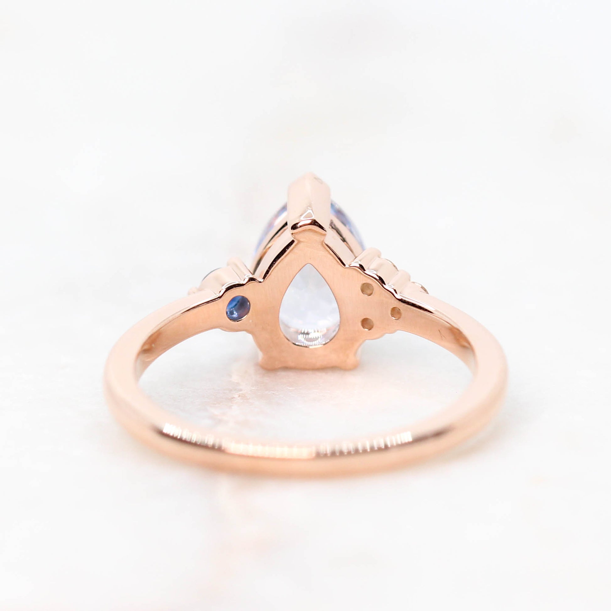 Fletcher Ring with a 1.87 Carat Blue Pear Sapphire and Accent Sapphires in 14k Rose Gold - Ready to Size and Ship - Midwinter Co. Alternative Bridal Rings and Modern Fine Jewelry