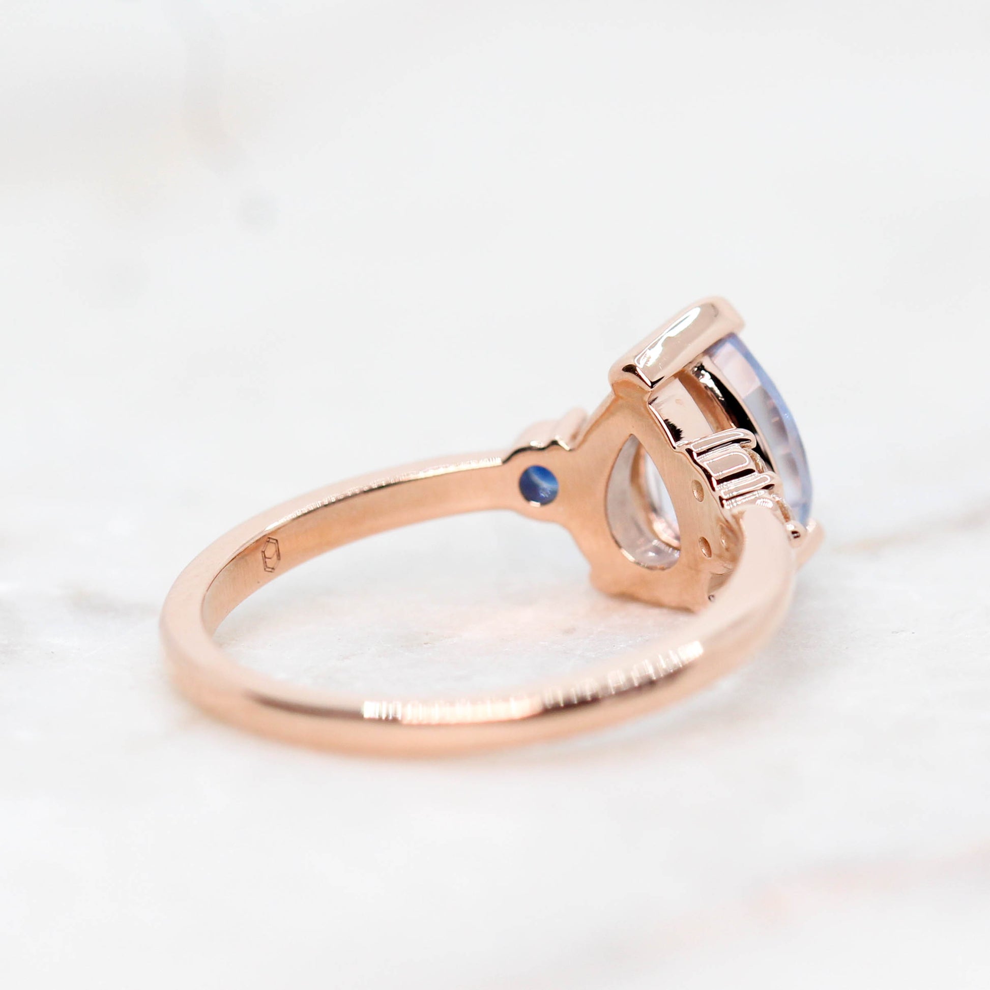 Fletcher Ring with a 1.87 Carat Blue Pear Sapphire and Accent Sapphires in 14k Rose Gold - Ready to Size and Ship - Midwinter Co. Alternative Bridal Rings and Modern Fine Jewelry