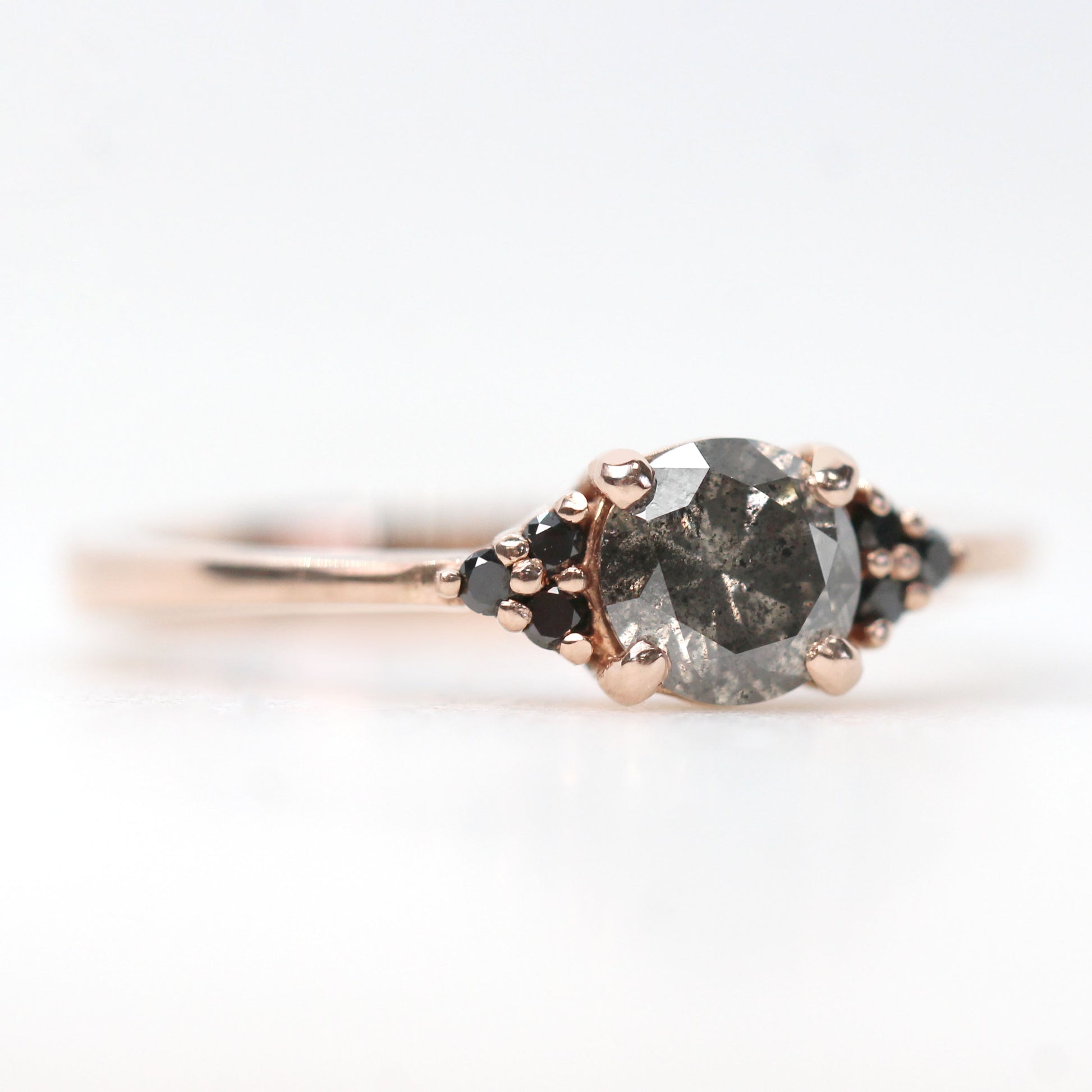 Imogene Ring with a 0.56 Carat Round Dark Gray Celestial Diamond and Black Accent Diamonds in 10k Rose Gold - Ready to Size and Ship - Midwinter Co. Alternative Bridal Rings and Modern Fine Jewelry