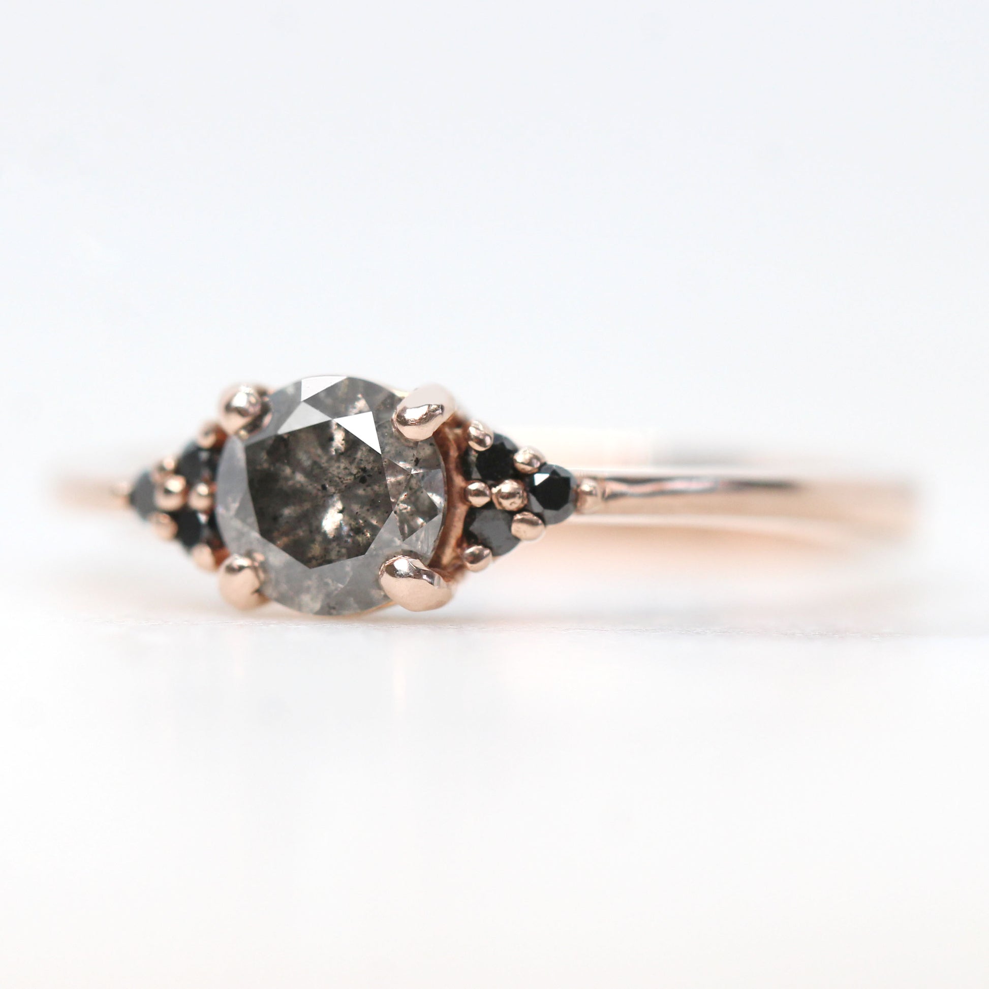 Imogene Ring with a 0.56 Carat Round Dark Gray Celestial Diamond and Black Accent Diamonds in 10k Rose Gold - Ready to Size and Ship - Midwinter Co. Alternative Bridal Rings and Modern Fine Jewelry