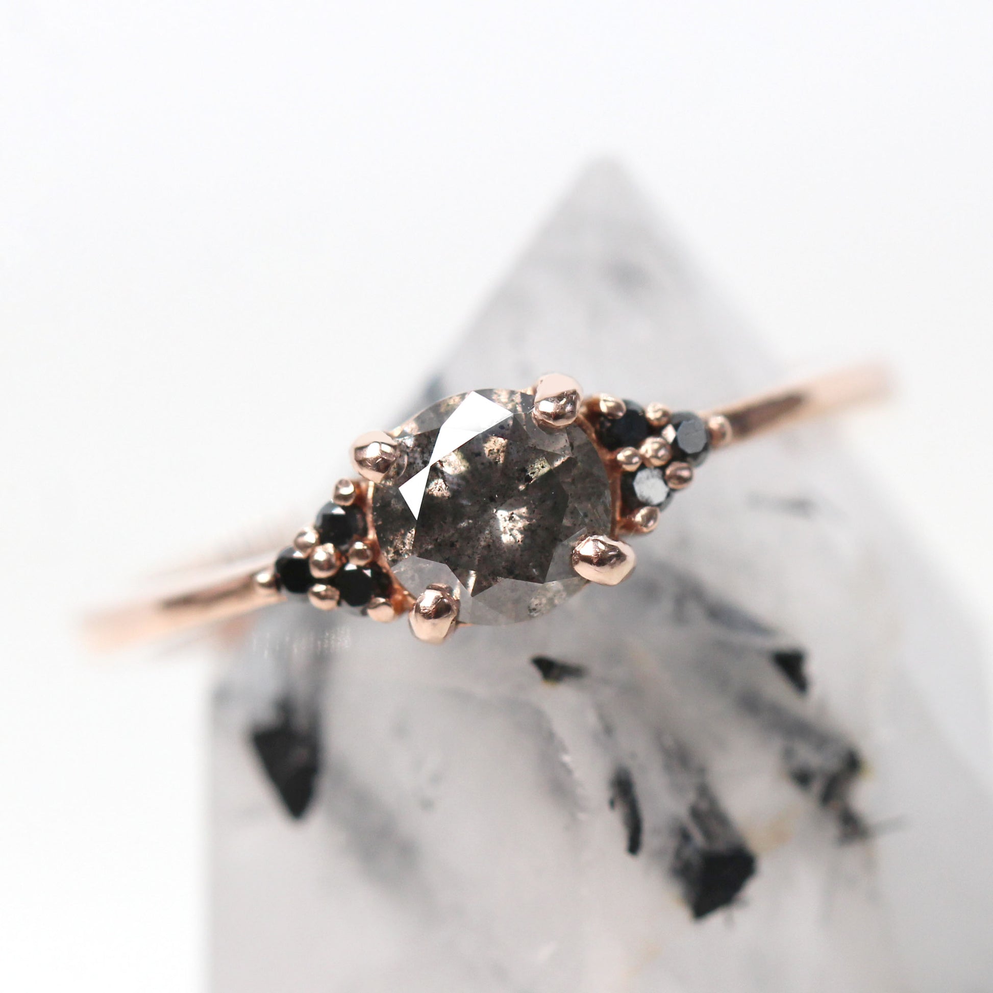 Imogene Ring with a 0.56 Carat Round Dark Gray Celestial Diamond and Black Accent Diamonds in 10k Rose Gold - Ready to Size and Ship - Midwinter Co. Alternative Bridal Rings and Modern Fine Jewelry