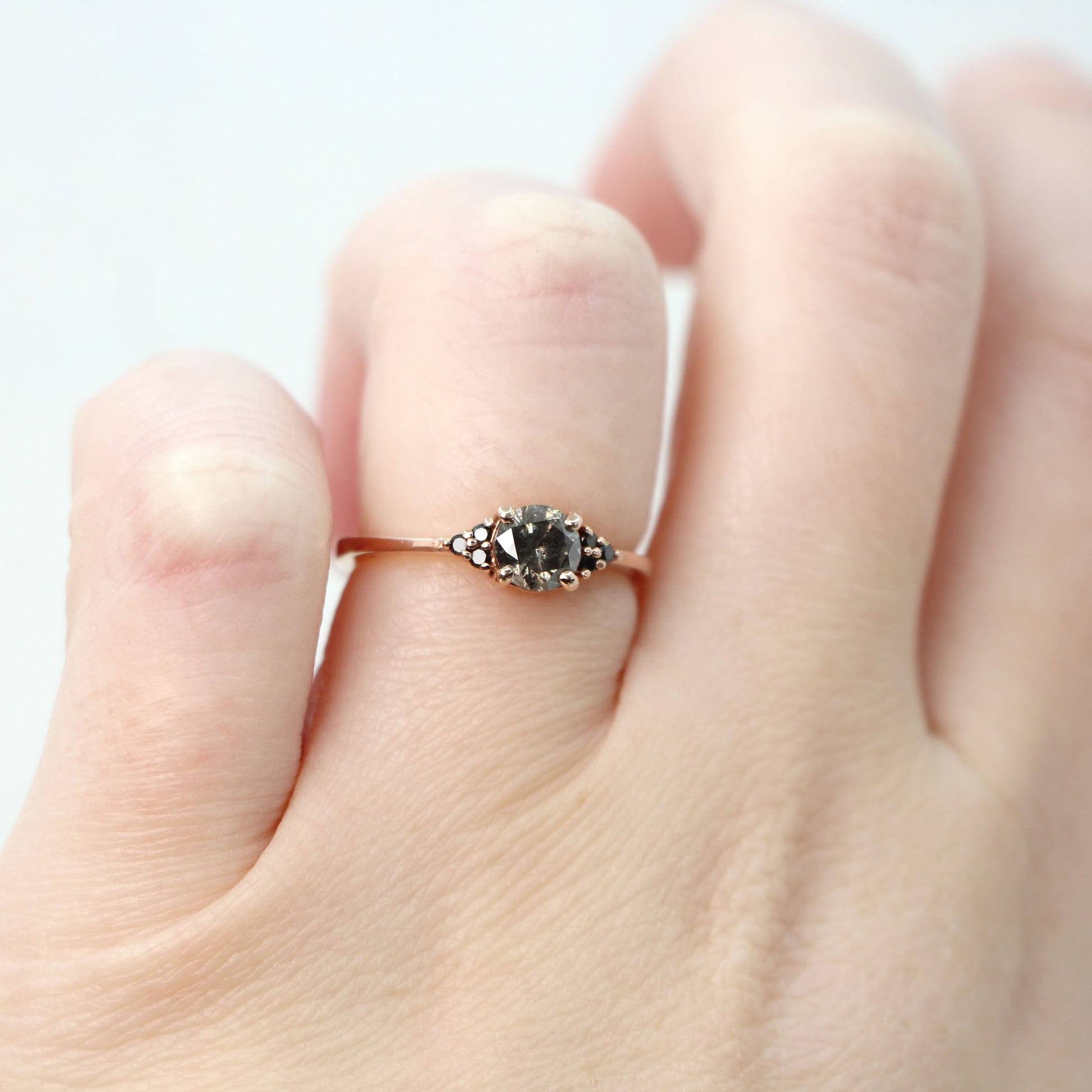 Imogene Ring with a 0.56 Carat Round Dark Gray Celestial Diamond and Black Accent Diamonds in 10k Rose Gold - Ready to Size and Ship - Midwinter Co. Alternative Bridal Rings and Modern Fine Jewelry