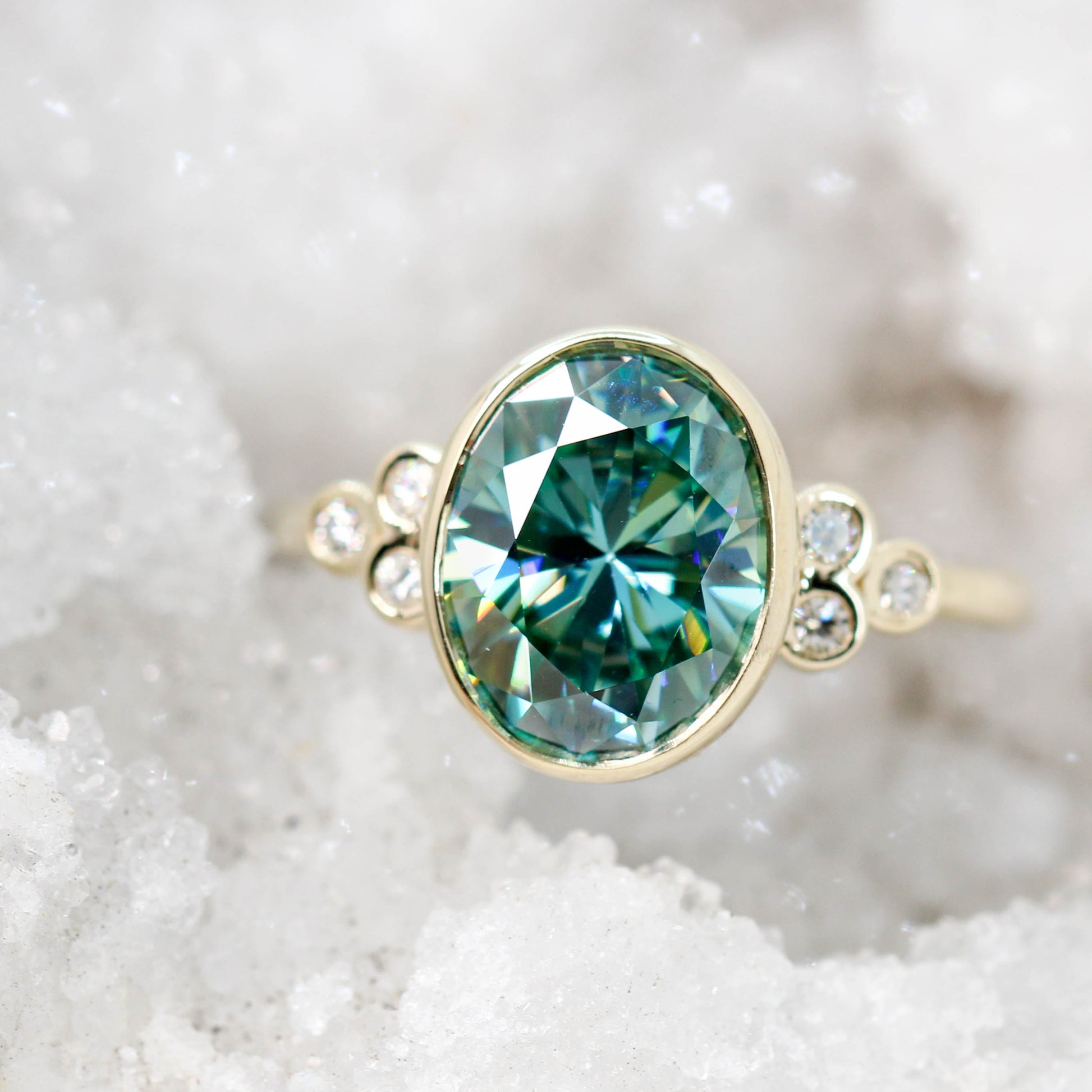 Sophia Ring with a 2.40 Carat Teal Oval Moissanite and Accent Diamonds in 14k Yellow Gold - Ready to Size and Ship - Midwinter Co. Alternative Bridal Rings and Modern Fine Jewelry