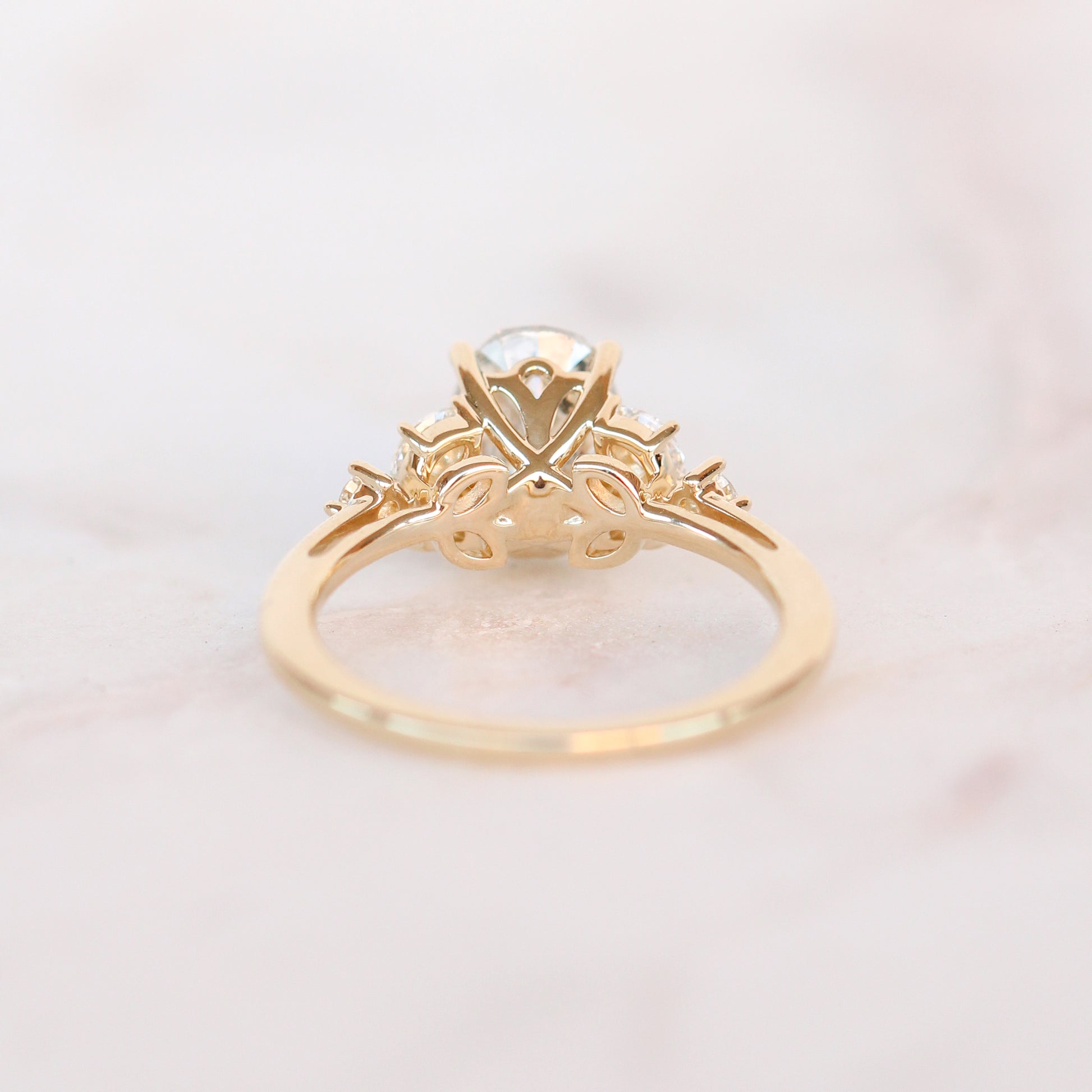 Andia Ring with a 2.02 Carat Clear Oval Celestial Diamond and White Accent Diamonds in 14k Yellow Gold - Ready to Size and Ship - Midwinter Co. Alternative Bridal Rings and Modern Fine Jewelry