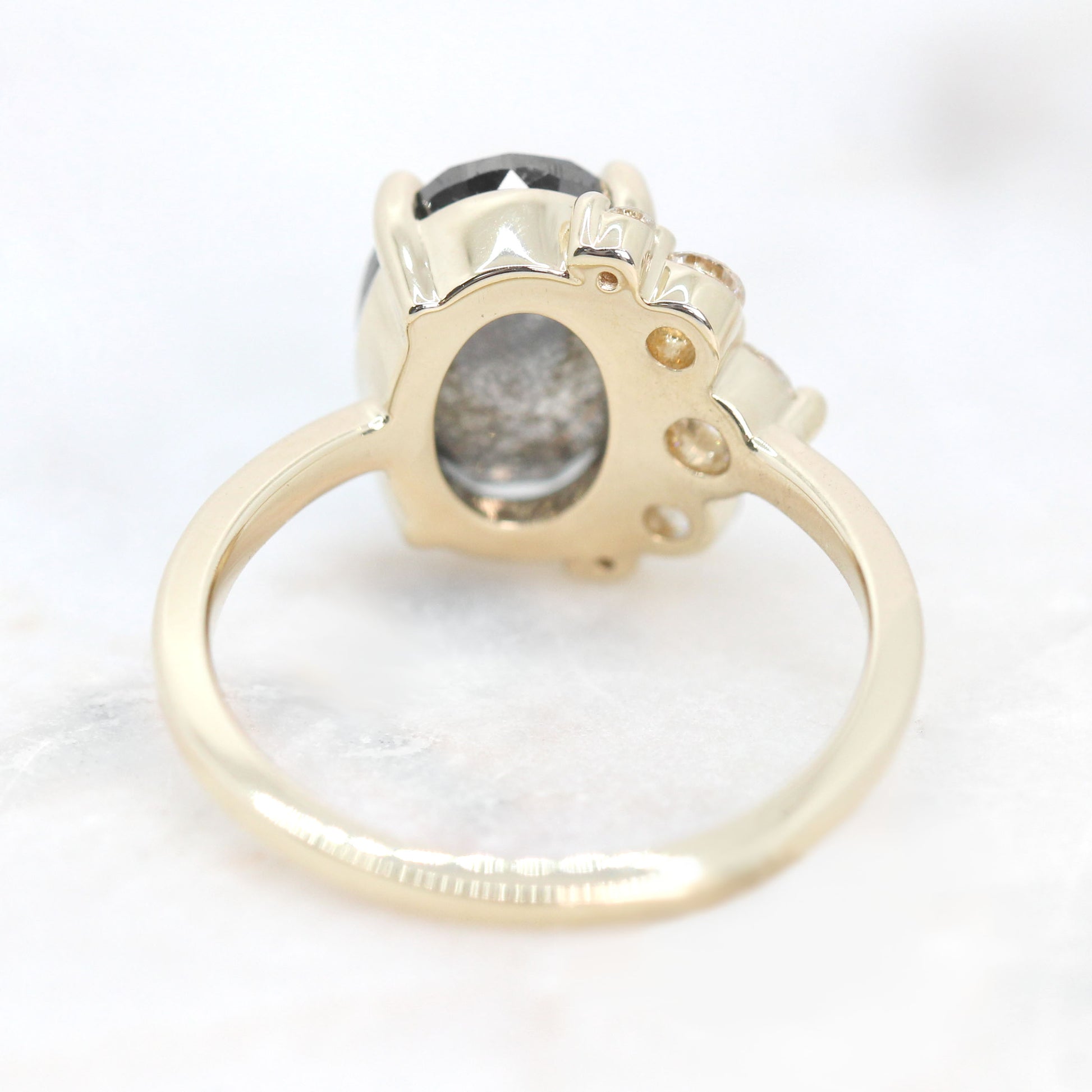 Carell Ring with a 3.07 Carat Dark Stormy Gray Oval Celestial Diamond and White Accent Diamonds in 14k Yellow Gold - Ready to Size and Ship - Midwinter Co. Alternative Bridal Rings and Modern Fine Jewelry