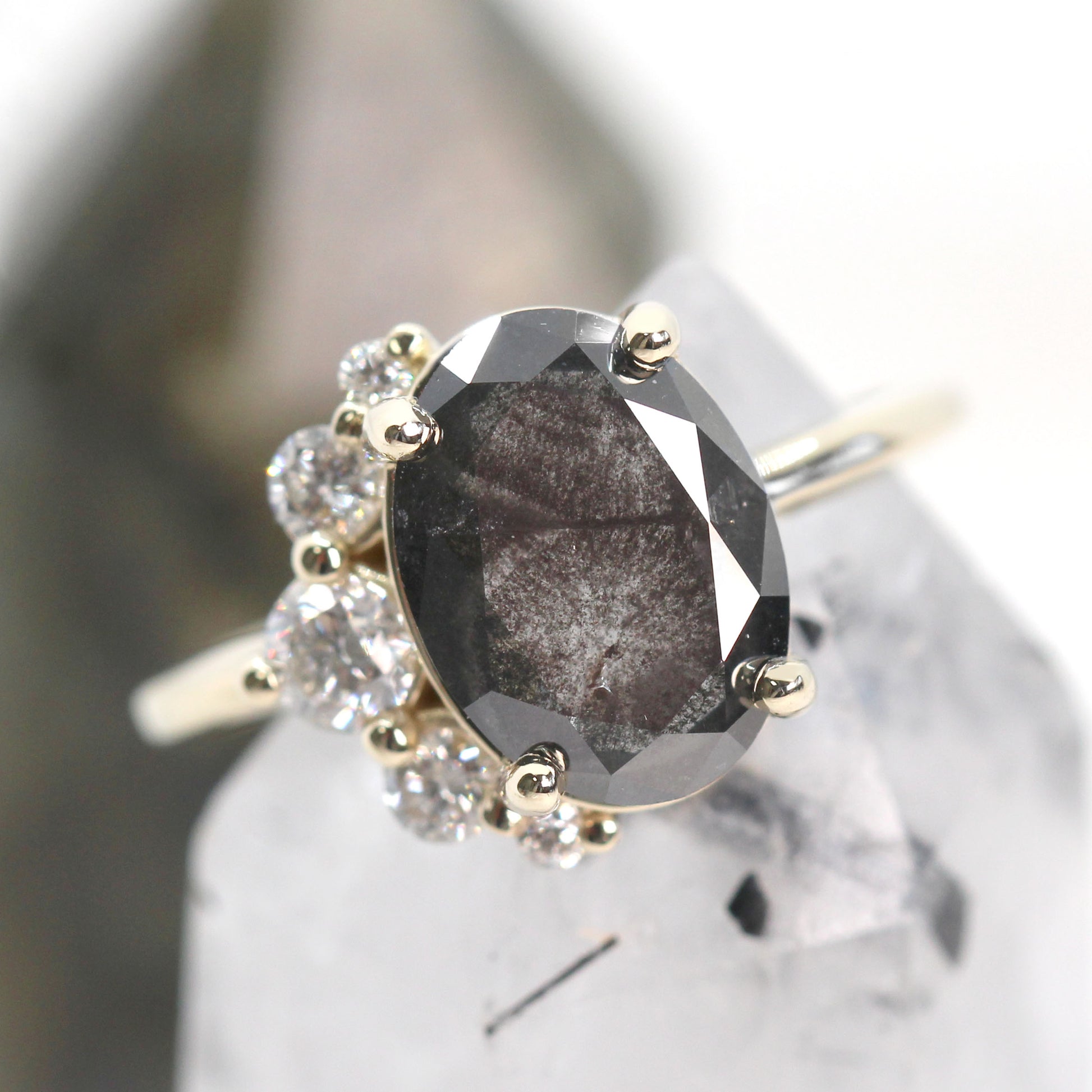 Carell Ring with a 3.07 Carat Dark Stormy Gray Oval Celestial Diamond and White Accent Diamonds in 14k Yellow Gold - Ready to Size and Ship - Midwinter Co. Alternative Bridal Rings and Modern Fine Jewelry