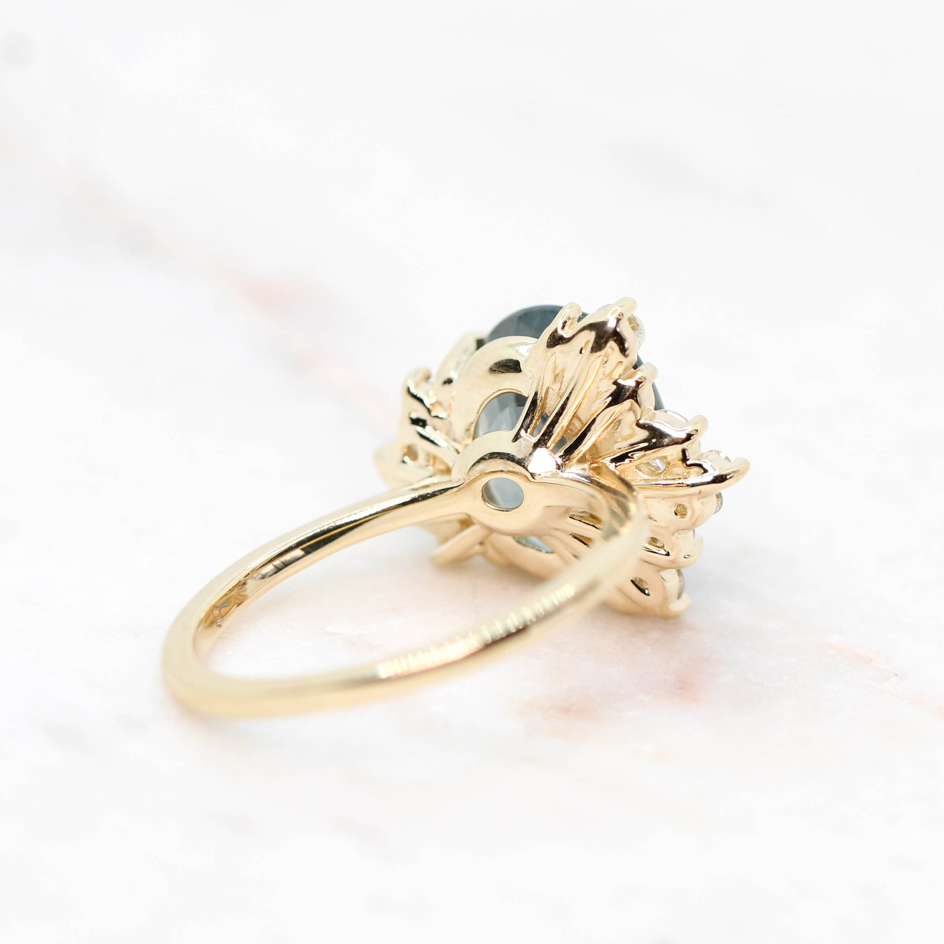 Orion Ring with a 6.00 Carat Teal Blue Oval Sapphire and White Accent Diamonds in 14k Yellow Gold - Ready to Size and Ship - Midwinter Co. Alternative Bridal Rings and Modern Fine Jewelry