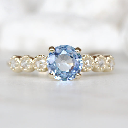 Rudy Ring with a 1.48 Carat Round Light Blue Sapphire and White Rose Cut Diamond Accents in 14K Yellow Gold - Ready to Size and Ship - Midwinter Co. Alternative Bridal Rings and Modern Fine Jewelry