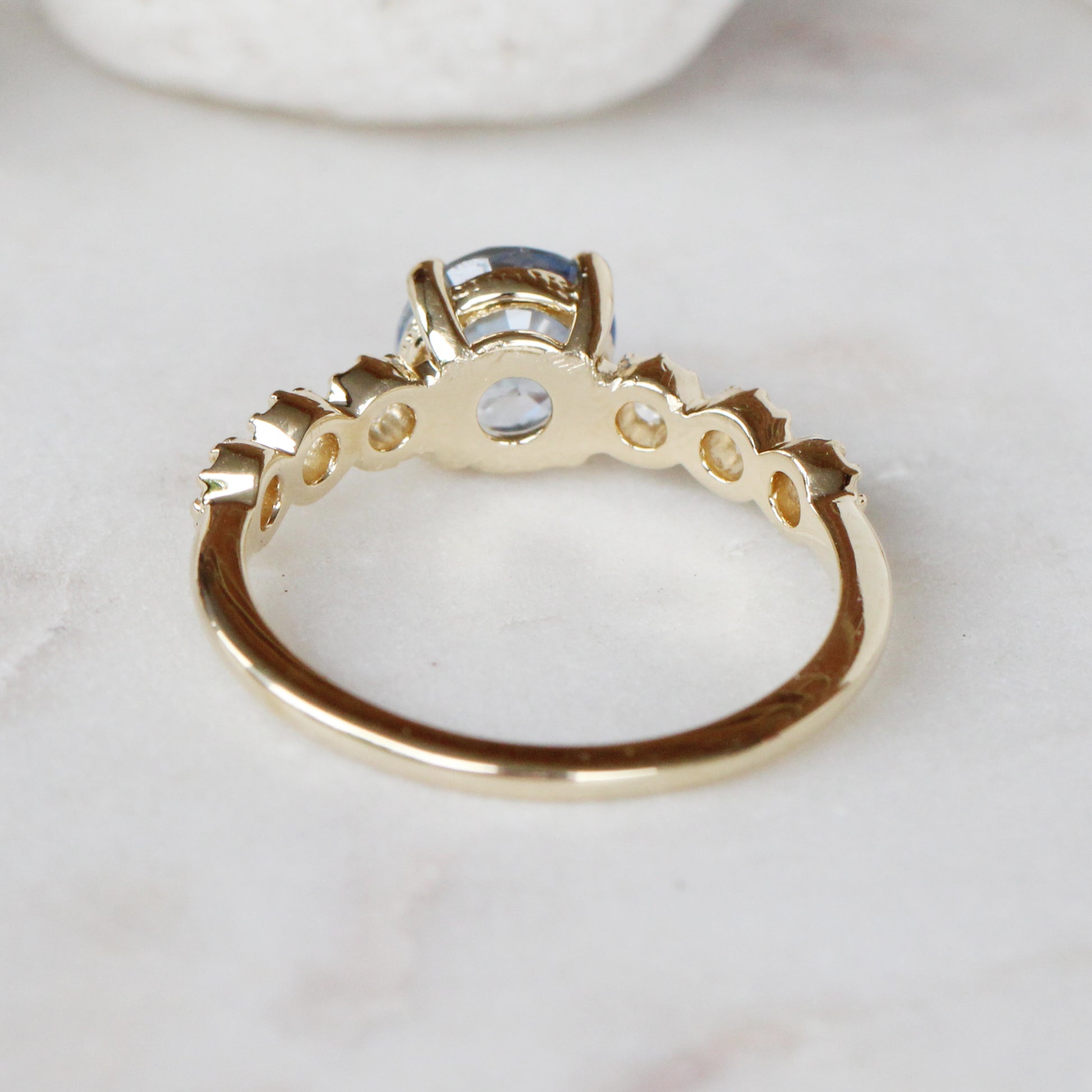 Rudy Ring with a 1.48 Carat Round Light Blue Sapphire and White Rose Cut Diamond Accents in 14K Yellow Gold - Ready to Size and Ship - Midwinter Co. Alternative Bridal Rings and Modern Fine Jewelry