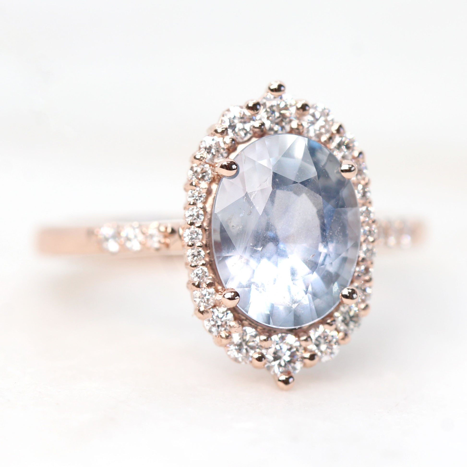 Grace Ring with a 2.45 Carat Periwinkle Blue Oval Sapphire and White Accent Diamonds in 14k Rose Gold - Ready to Size and Ship - Midwinter Co. Alternative Bridal Rings and Modern Fine Jewelry