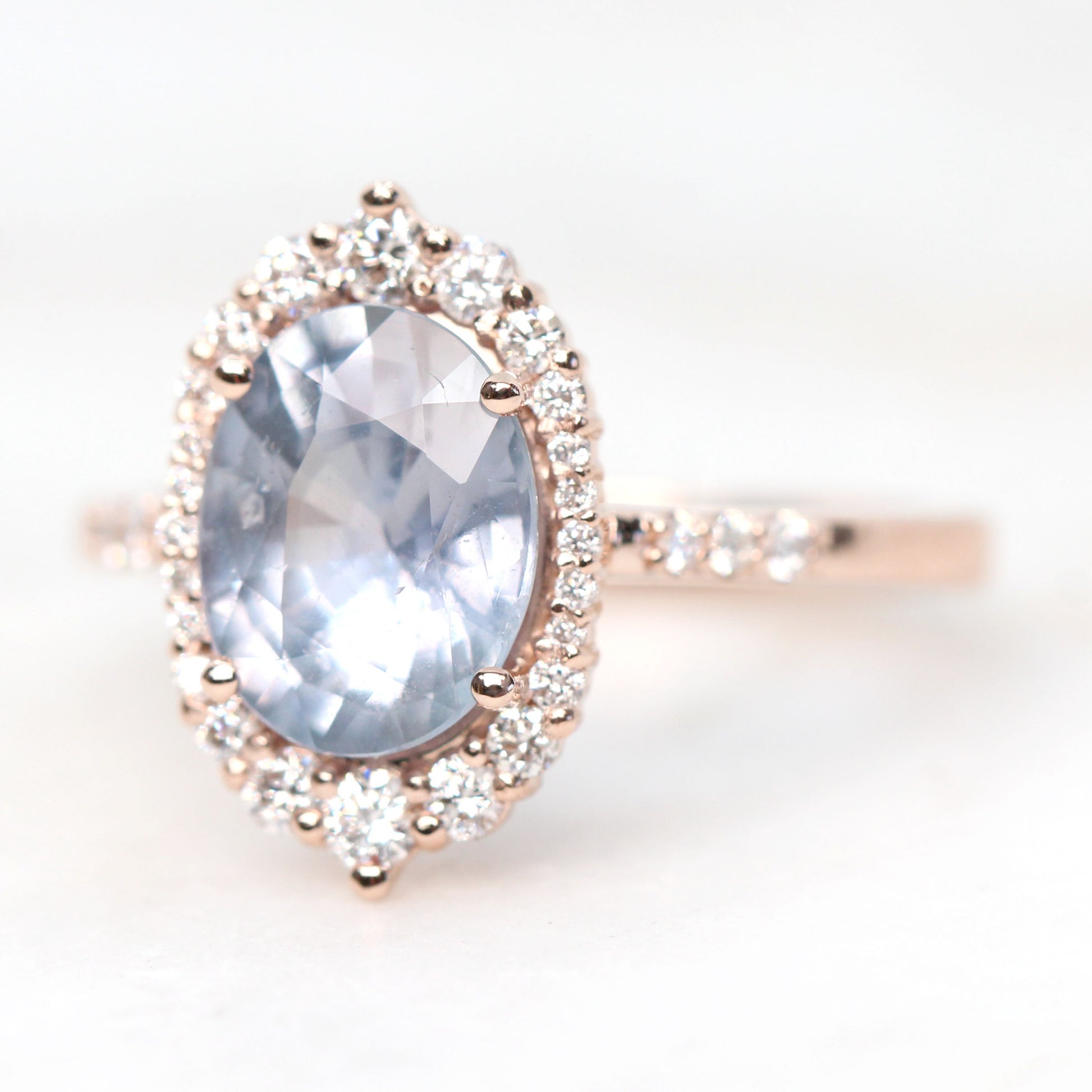 Grace Ring with a 2.45 Carat Periwinkle Blue Oval Sapphire and White Accent Diamonds in 14k Rose Gold - Ready to Size and Ship - Midwinter Co. Alternative Bridal Rings and Modern Fine Jewelry