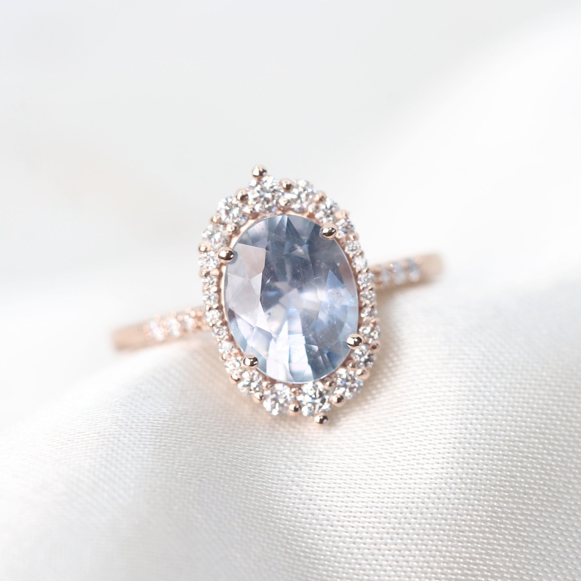 Grace Ring with a 2.45 Carat Periwinkle Blue Oval Sapphire and White Accent Diamonds in 14k Rose Gold - Ready to Size and Ship - Midwinter Co. Alternative Bridal Rings and Modern Fine Jewelry