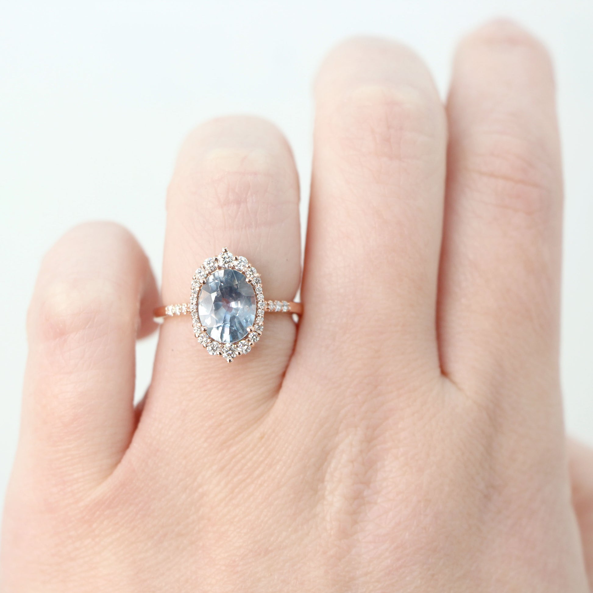 Grace Ring with a 2.45 Carat Periwinkle Blue Oval Sapphire and White Accent Diamonds in 14k Rose Gold - Ready to Size and Ship - Midwinter Co. Alternative Bridal Rings and Modern Fine Jewelry