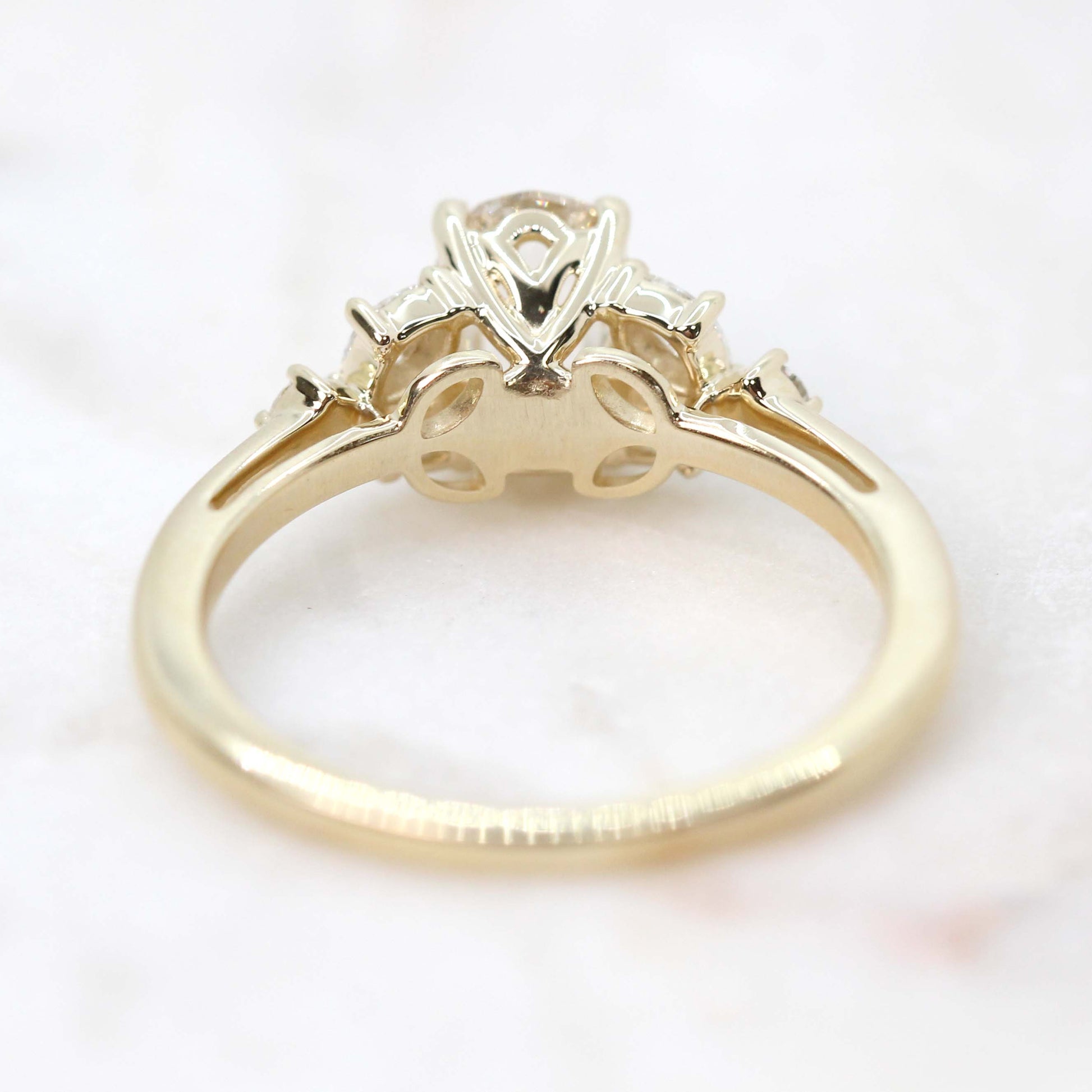 Andia Ring with a 0.73 Carat Clear Oval Celestial Diamond and White Accent Diamonds in 14k Yellow Gold - Ready to Size and Ship - Midwinter Co. Alternative Bridal Rings and Modern Fine Jewelry