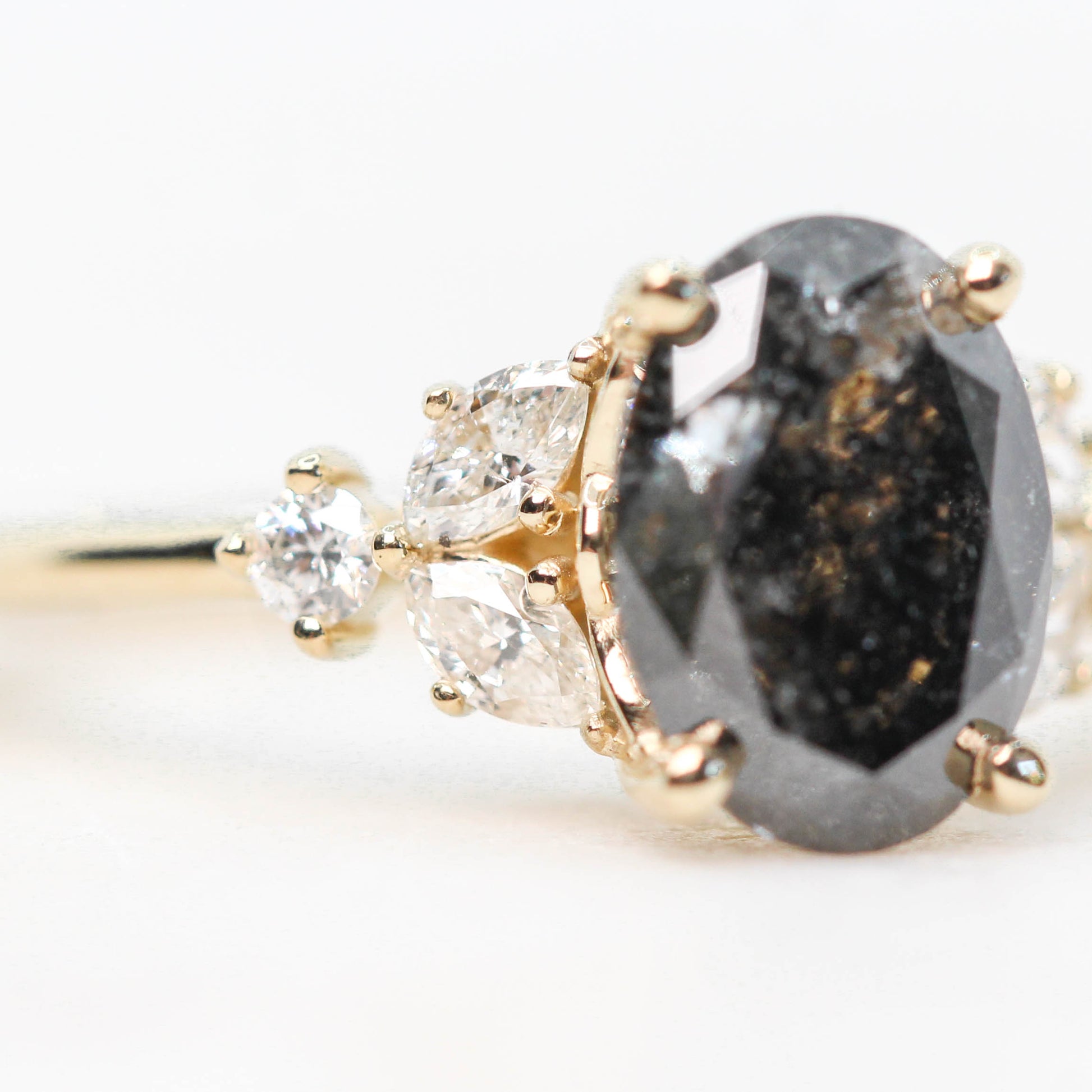 Andia Ring with a 1.80 Carat Oval Black Celestial Diamond and White Accent Diamonds in 14k Yellow Gold - Midwinter Co. Alternative Bridal Rings and Modern Fine Jewelry