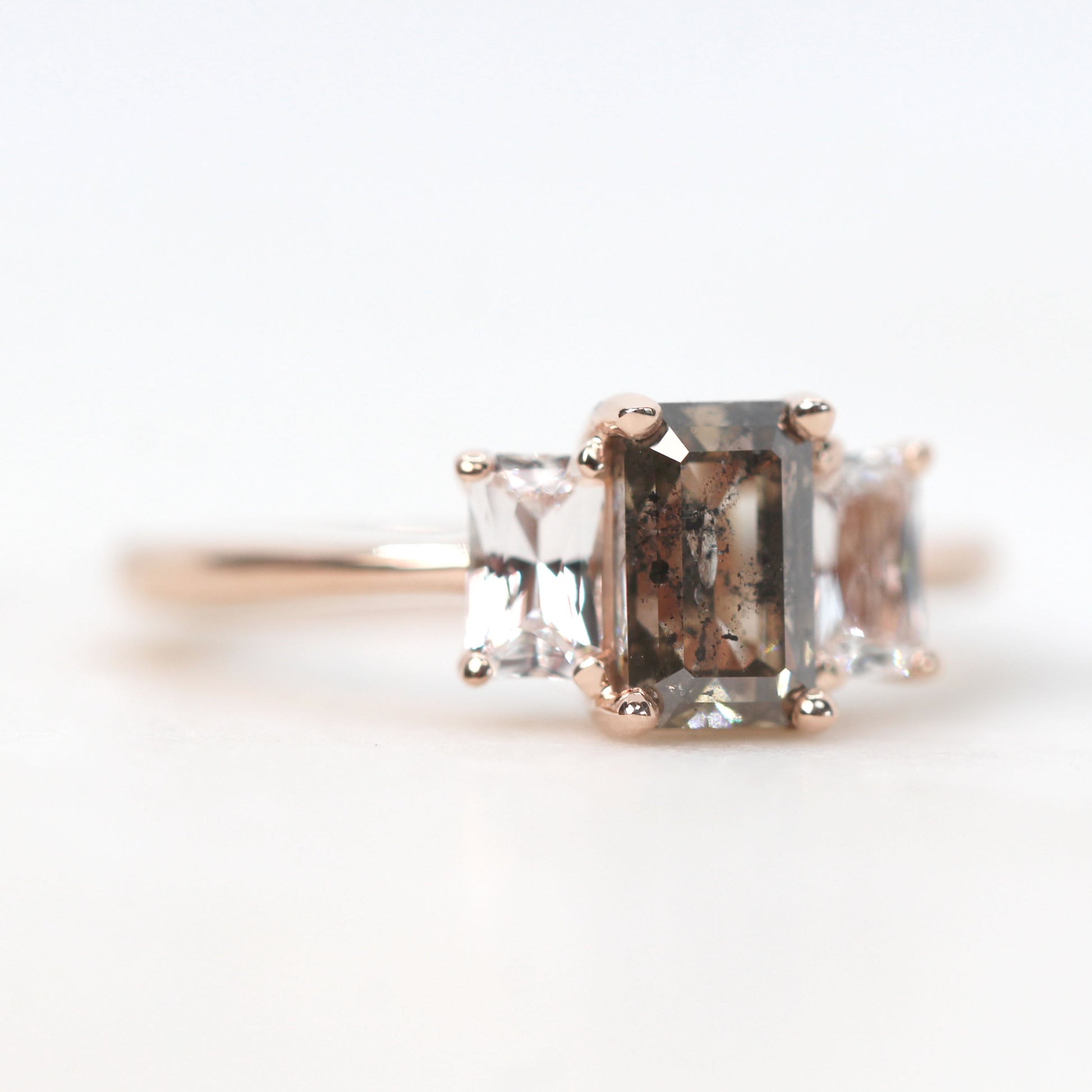 Hellen Ring with a 1.40 Carat Emerald Cut Champagne Brown Celestial Diamond and White Sapphire Accents in 14k Rose Gold - Ready to Size and Ship - Midwinter Co. Alternative Bridal Rings and Modern Fine Jewelry