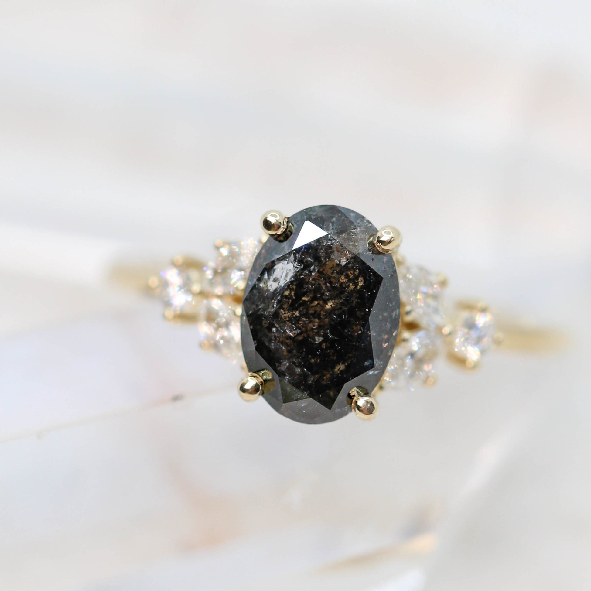 Andia Ring with a 1.80 Carat Oval Black Celestial Diamond and White Accent Diamonds in 14k Yellow Gold - Midwinter Co. Alternative Bridal Rings and Modern Fine Jewelry