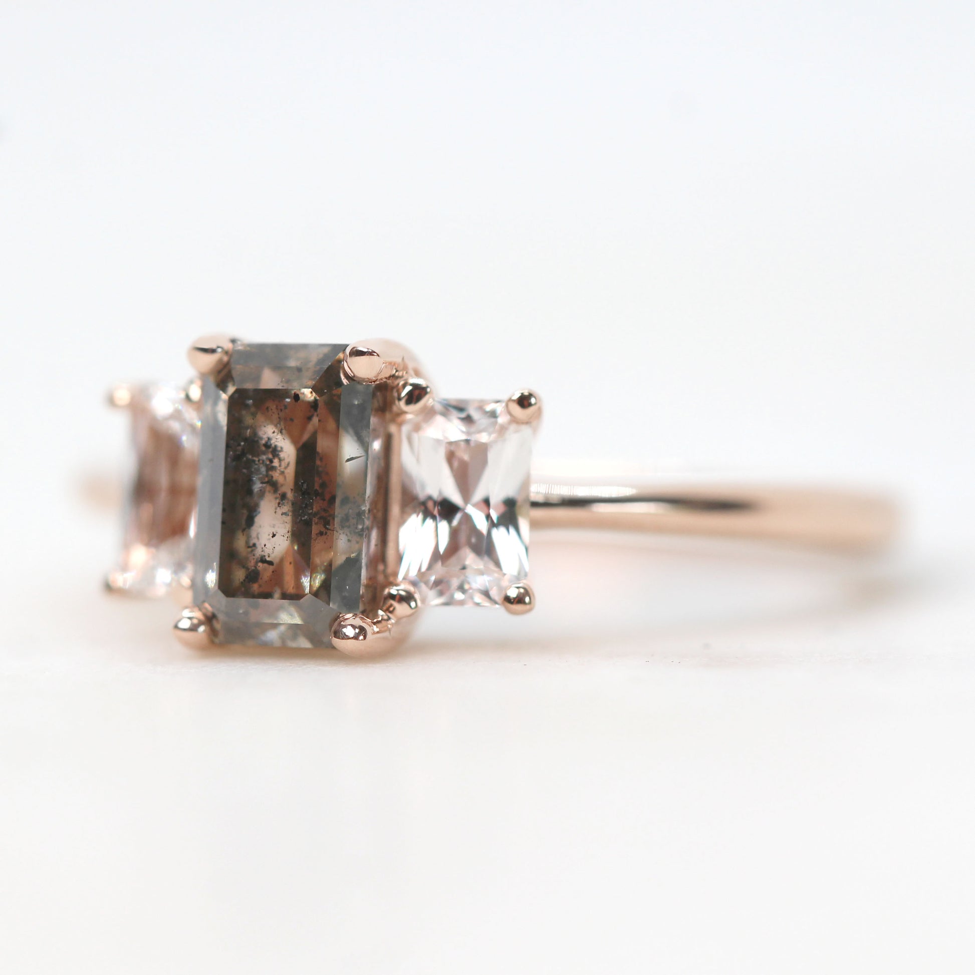 Hellen Ring with a 1.40 Carat Emerald Cut Champagne Brown Celestial Diamond and White Sapphire Accents in 14k Rose Gold - Ready to Size and Ship - Midwinter Co. Alternative Bridal Rings and Modern Fine Jewelry