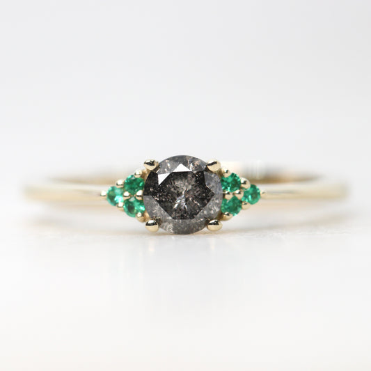 Imogene Ring with a 0.46 Carat Round Dark Gray Celestial Diamond and Emerald Accents in 14k Yellow Gold - Ready to Size and Ship - Midwinter Co. Alternative Bridal Rings and Modern Fine Jewelry