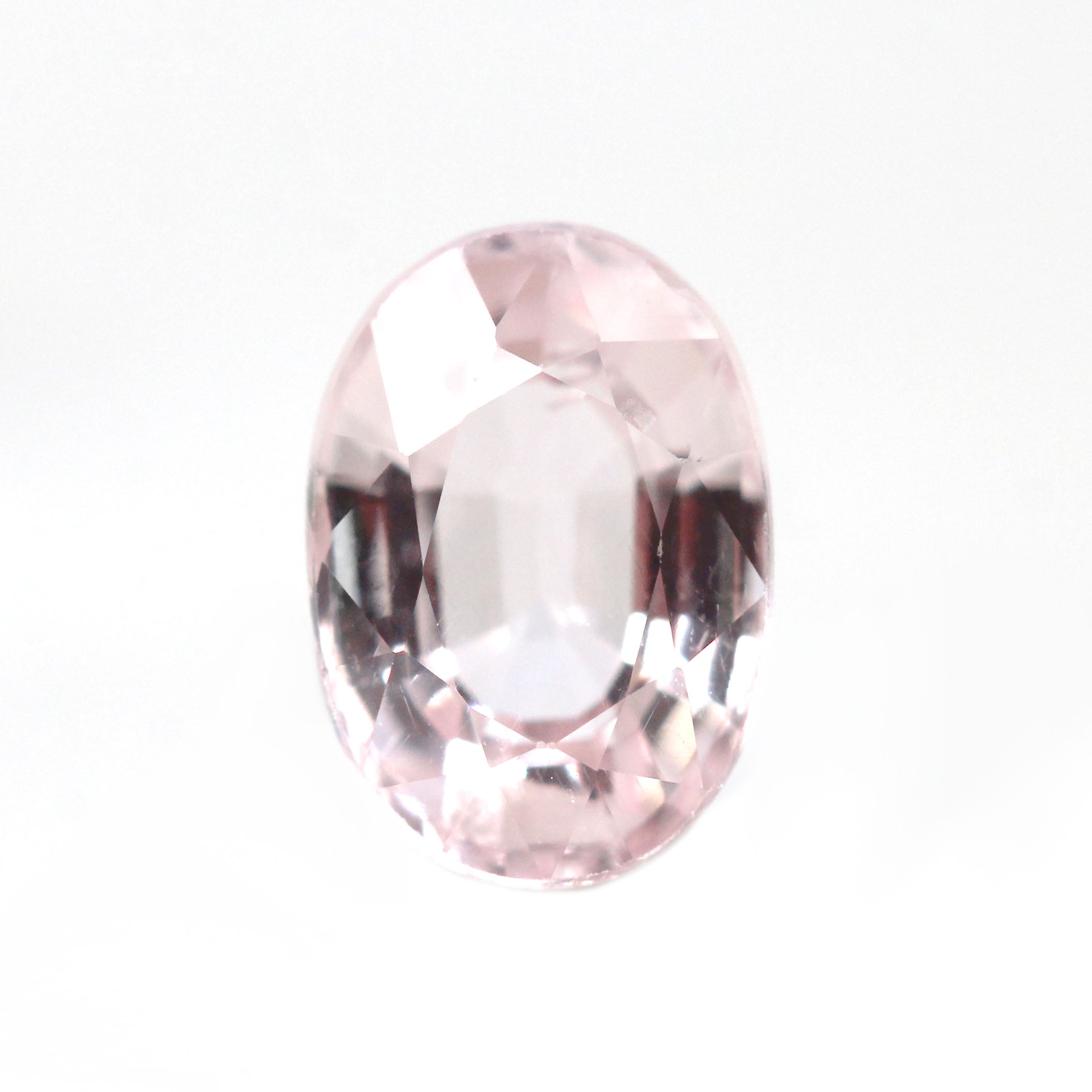 0.77 Carat Clear Light Pink Oval Montana Sapphire for Custom Work -  Inventory Code PSO077