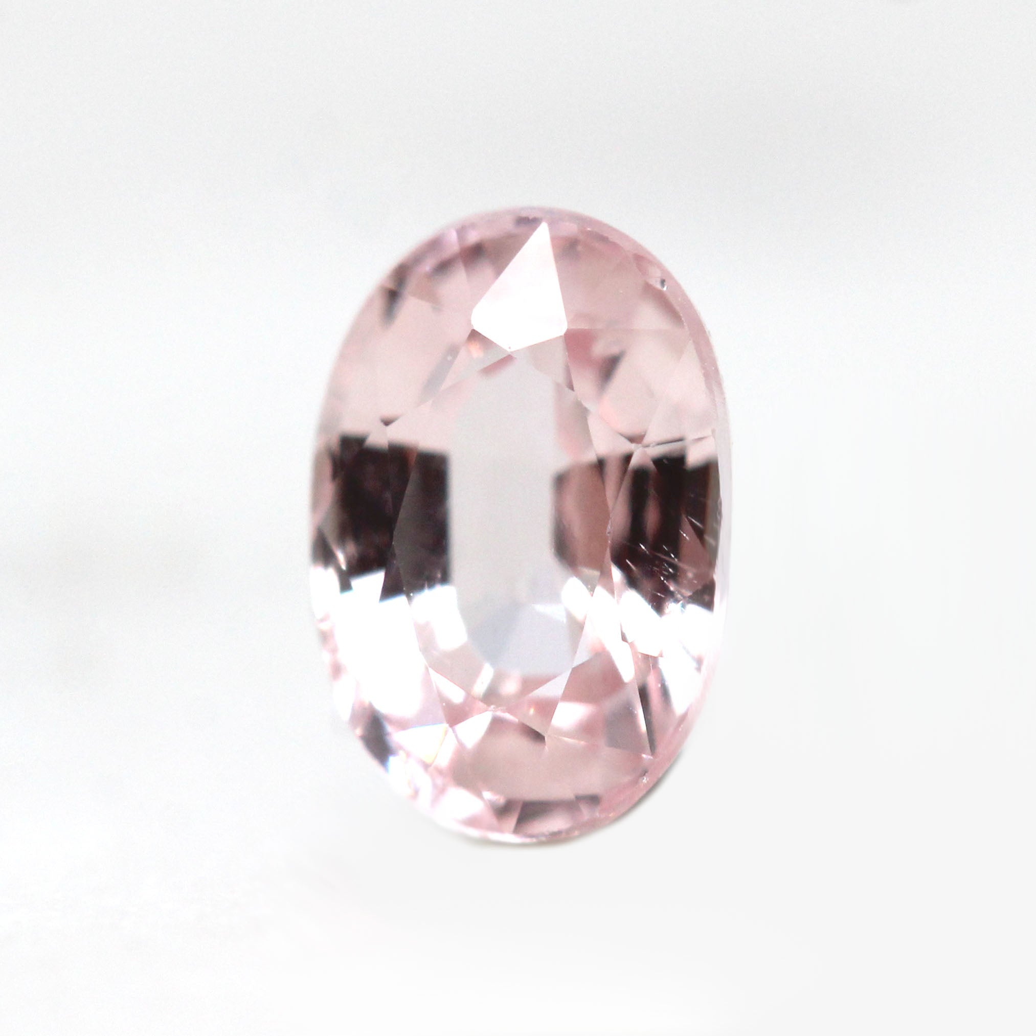 0.77 Carat Clear Light Pink Oval Montana Sapphire for Custom Work -  Inventory Code PSO077