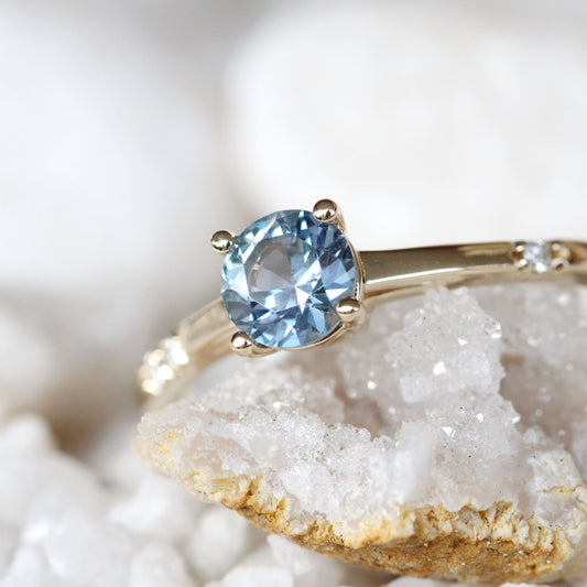 Xavier Ring with a 0.69 Carat Blue Sapphire and Three Asymmetrical White Diamond Accents in 14k Yellow Gold - Ready to Size and Ship - Midwinter Co. Alternative Bridal Rings and Modern Fine Jewelry