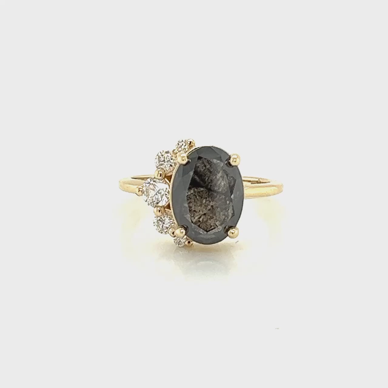 Project: Custom Carell Ring with a 3 Carat Dark Stormy Gray Oval Salt and Pepper Diamond and White Accent Diamonds in 14k Yellow Gold